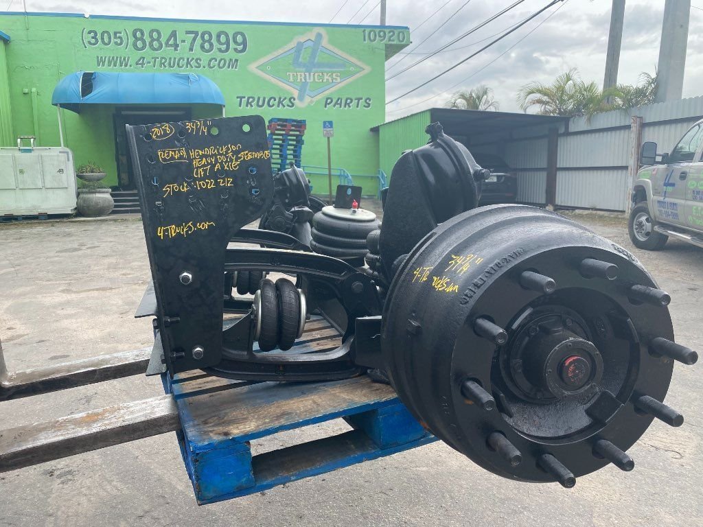 Refurbished HENDRICKSON STEERABLE LIFT AXLE Tag Axles in Miami, FL