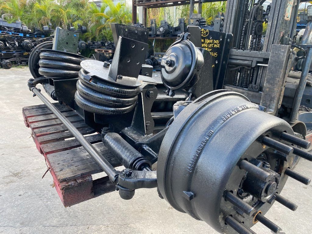 Refurbished HENDRICKSON STEERABLE LIFT AXLE Tag Axles in Miami, FL