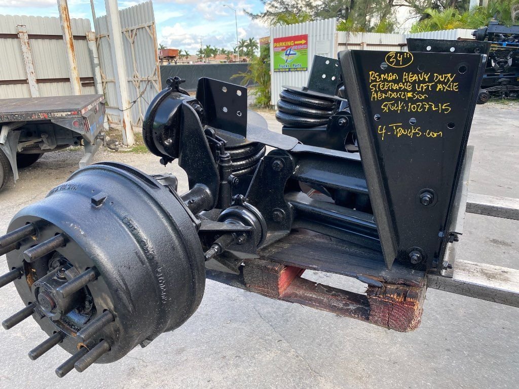 Refurbished HENDRICKSON STEERABLE LIFT AXLE Tag Axles in Miami, FL