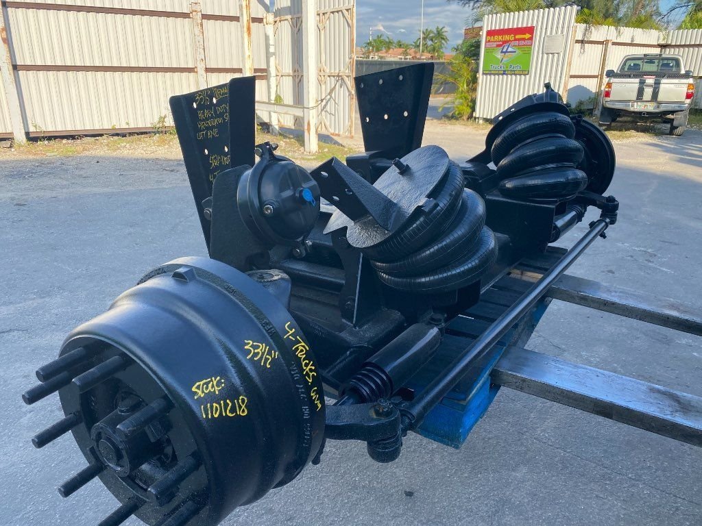 Refurbished HENDRICKSON STEERABLE LIFT AXLE Tag Axles in Miami, FL